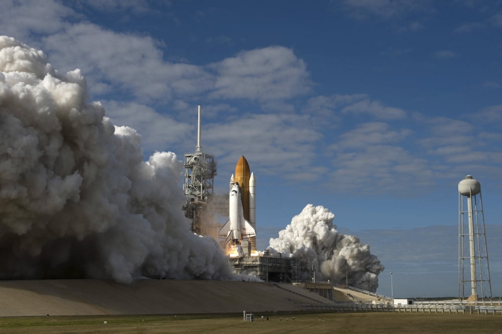 Space Shuttle Atlantis lifts off from its launch pad at Kennedy Space Center Florida Canvas Art - Stocktrek Images (34 x 23)