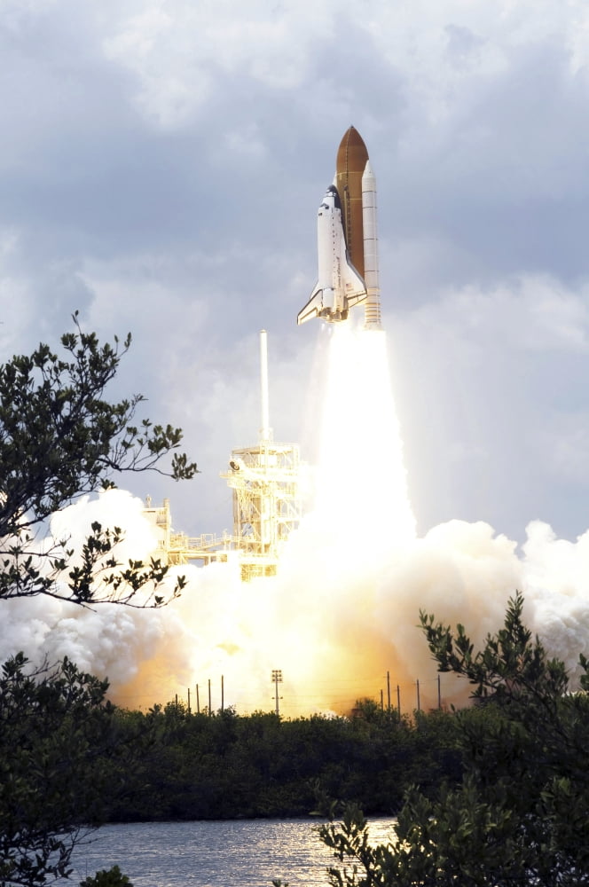 Space Shuttle Atlantis lifts off from its launch pad toward Earth orbit Canvas Art - Stocktrek Images (23 x 34)