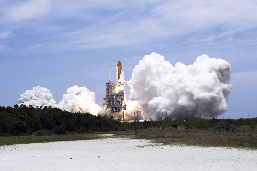 Space Shuttle Atlantis lifts off from its launch pad toward Earth orbit Canvas Art - Stocktrek Images (34 x 23)