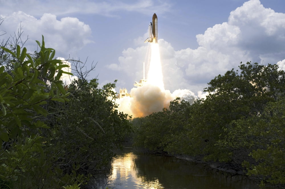 Space Shuttle Atlantis lifts off from its launch pad toward Earth orbit Canvas Art - Stocktrek Images (34 x 23)
