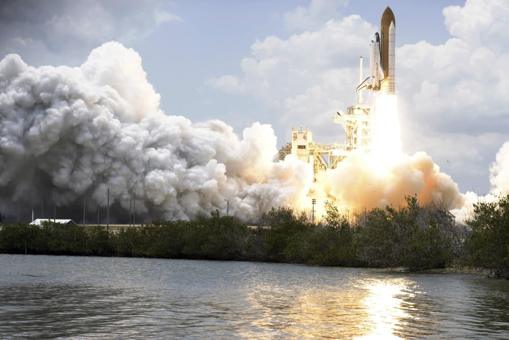 Space Shuttle Atlantis lifts off from its launch pad toward Earth orbit Canvas Art - Stocktrek Images (34 x 23)