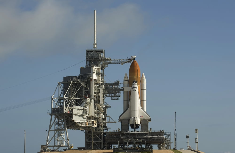 Space Shuttle Discovery sits ready on the launch pad at Kennedy Space Center Canvas Art - Stocktrek Images (35 x 23)