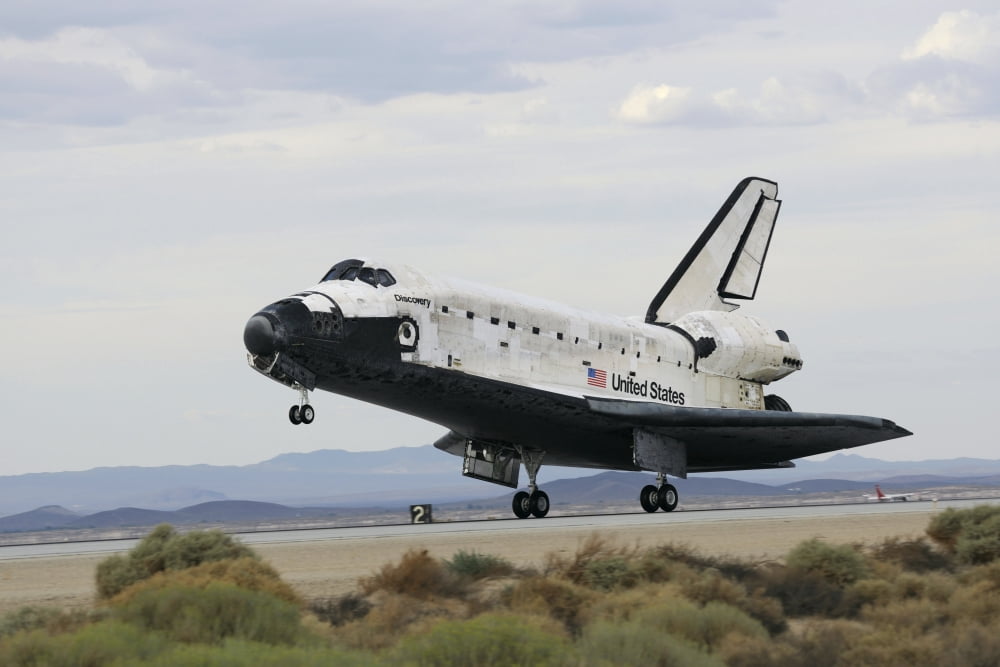 Space Shuttle Discoverys main landing gear touches down for landing Canvas Art - Stocktrek Images (34 x 23)
