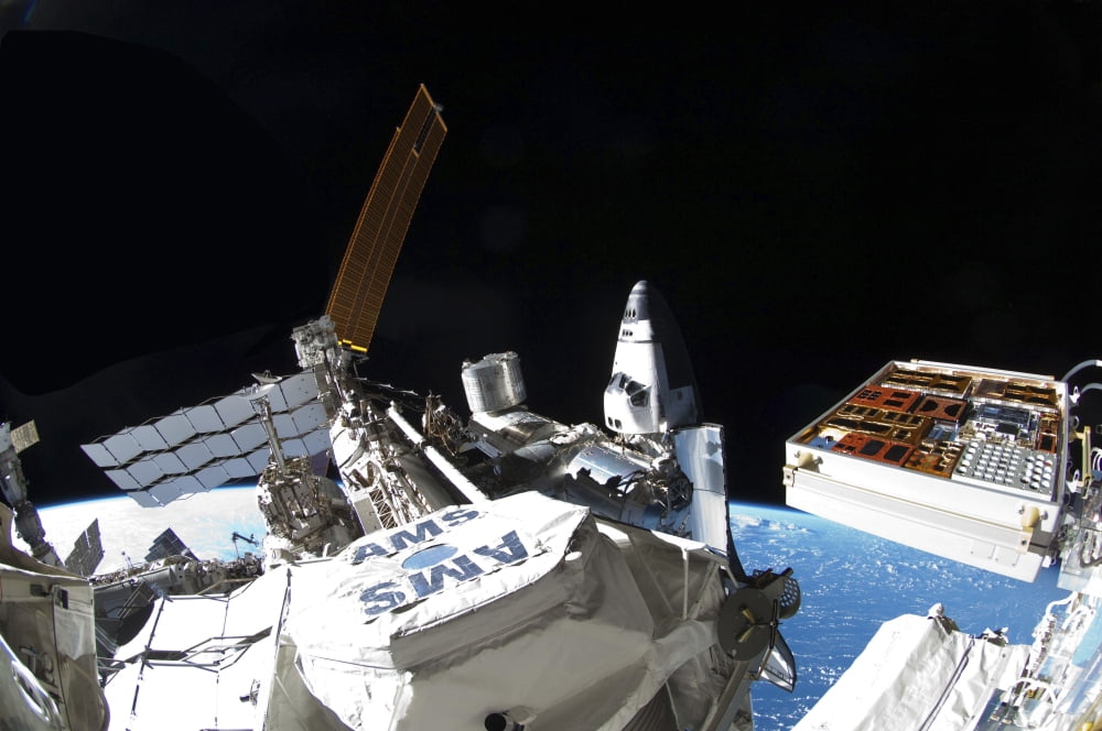 Space shuttle Atlantis docked to the International Space Station Canvas Art - Stocktrek Images (34 x 23)