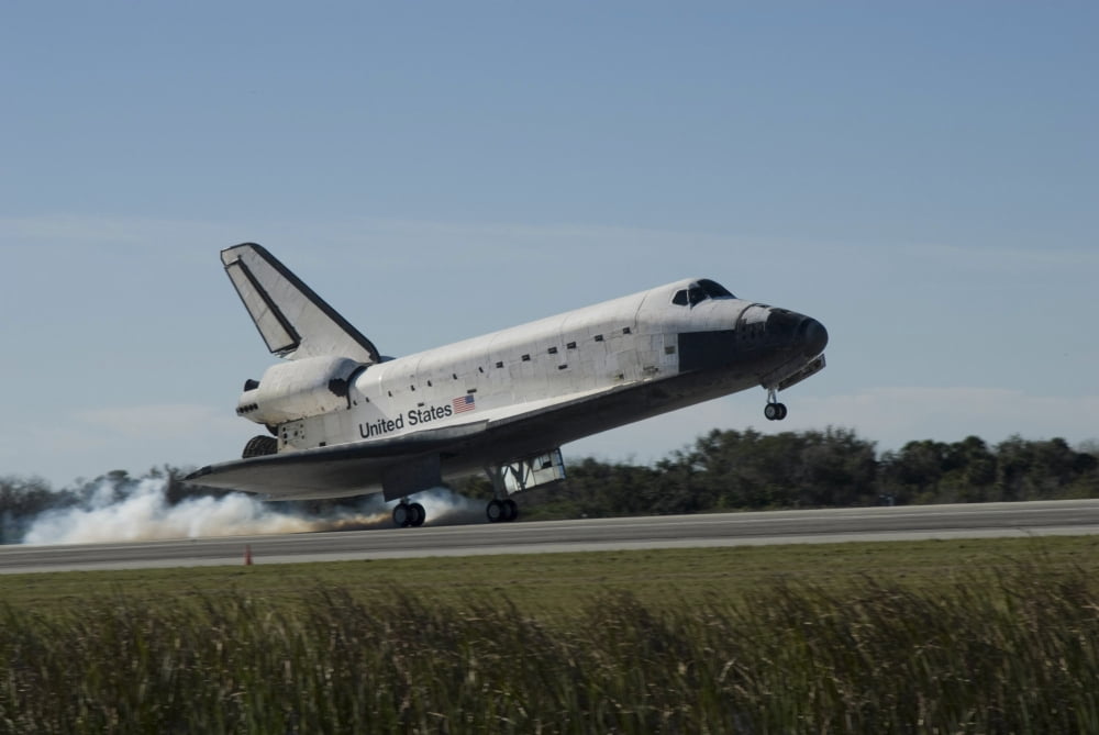 Space shuttle Atlantis touches down at Kennedy Space Center Florida Canvas Art - Stocktrek Images (34 x 23)