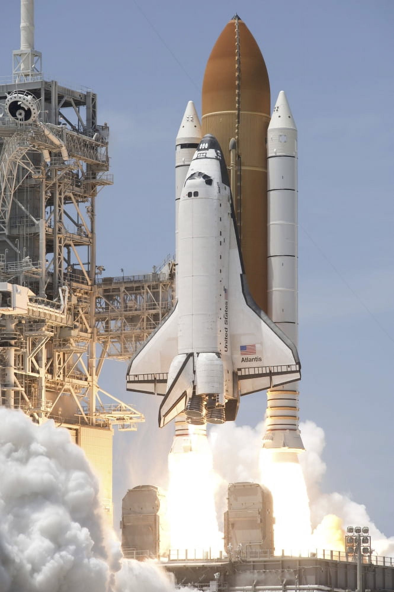 Space shuttle Atlantis twin solid rocket boosters ignite to propel the spacecraft off Kennedy Space Centers Launch Pad 39A Canvas Art - Stocktrek Images (23 x 34)