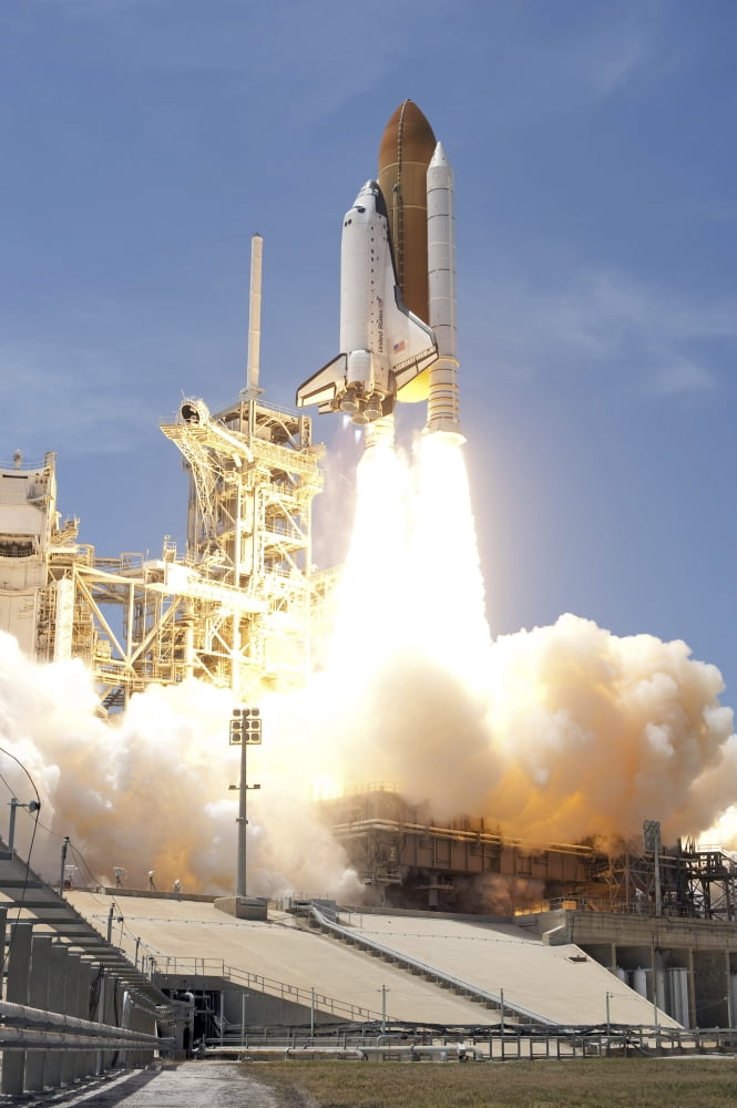 Space shuttle Atlantis twin solid rocket boosters propel to launch the spacecraft off Kennedy Space Centers Launch Pad 39A Canvas Art - Stocktrek Images (23 x 34)
