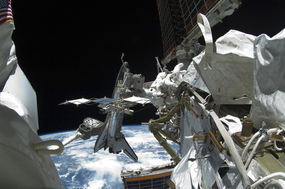 Space shuttle Endeavour docked to the International Space Station Canvas Art - Stocktrek Images (34 x 23)