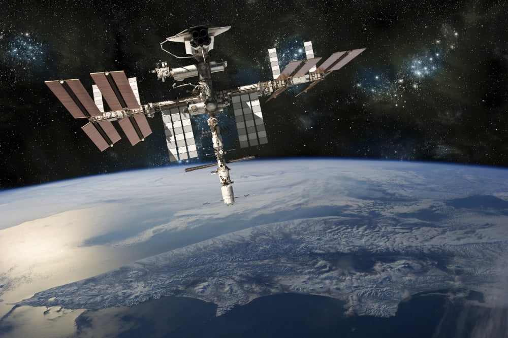Space shuttle docked at the International Space Station Canvas Art - Marc WardStocktrek Images (34 x 23)