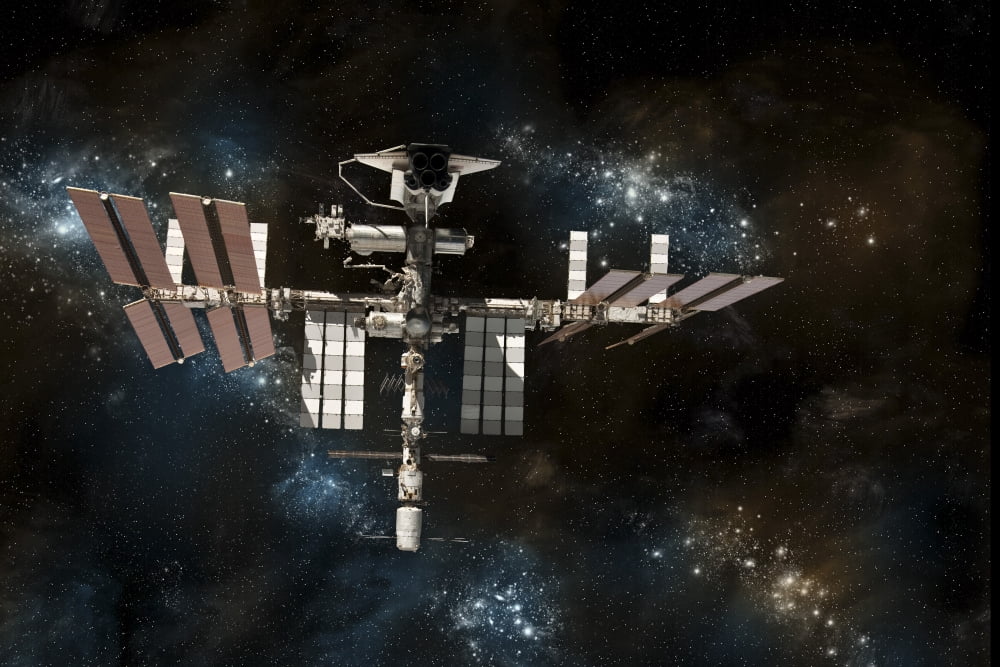 Space shuttle docked at the International Space Station on a background of stars Canvas Art - Marc WardStocktrek Images (18 x 12)