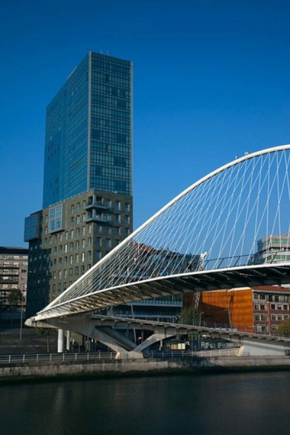 Spain Bilbao Zubizuri Bridge over Rio de Bilbao Canvas Art - Walter Bibikow DanitaDelimont (25 x 38)