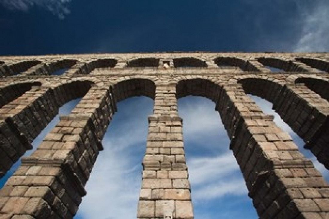 Spain Castilla y Leon Segovia Roman Aqueduct Canvas Art - Walter Bibikow DanitaDelimont (19 x 12)