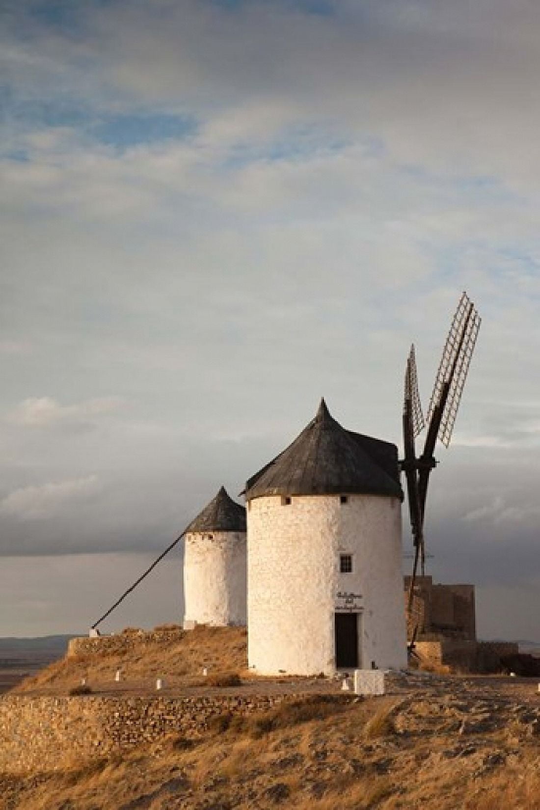 Spain La Mancha Consuegra La Mancha Windmills Canvas Art - Walter Bibikow DanitaDelimont (25 x 38)