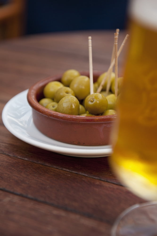 Spain Majorca Beer and olives in cafe Palma Canvas Art - Ian Cumming Design Pics (24 x 38)