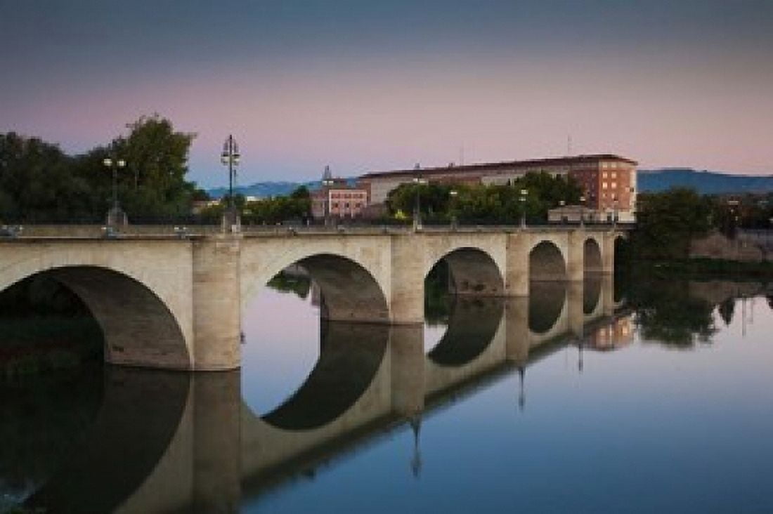 Spain Puente de Piedra bridge Ebro River Canvas Art - Walter Bibikow DanitaDelimont (38 x 25)