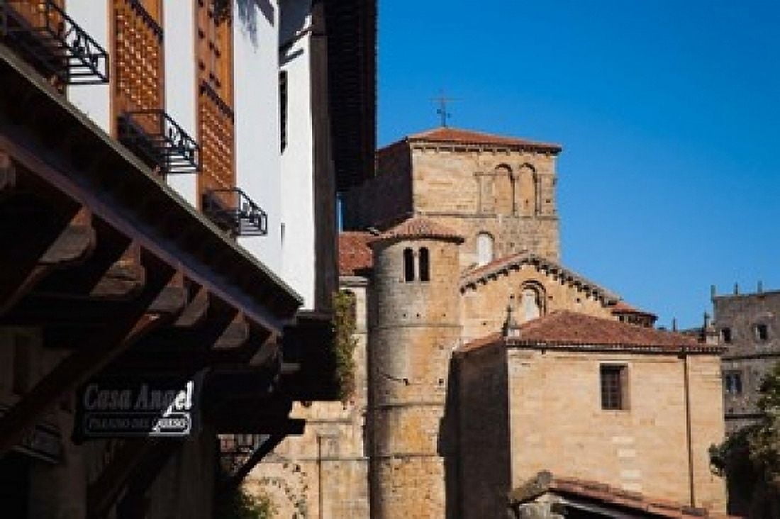 Spain Santillana del Mar Iglesia de Colegiata Canvas Art - Walter Bibikow DanitaDelimont (19 x 12)