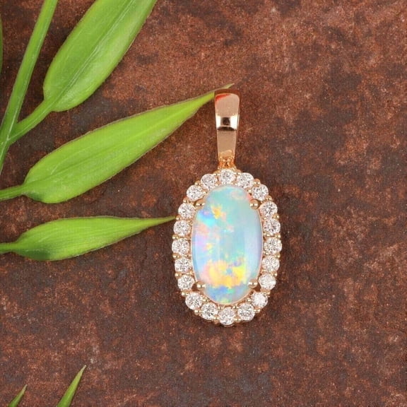 Sparkle Jewels Women's Lab Created Fire Opal Oval Cut Halo Pendant 14k Rose Gold Plated Silver Free Chain