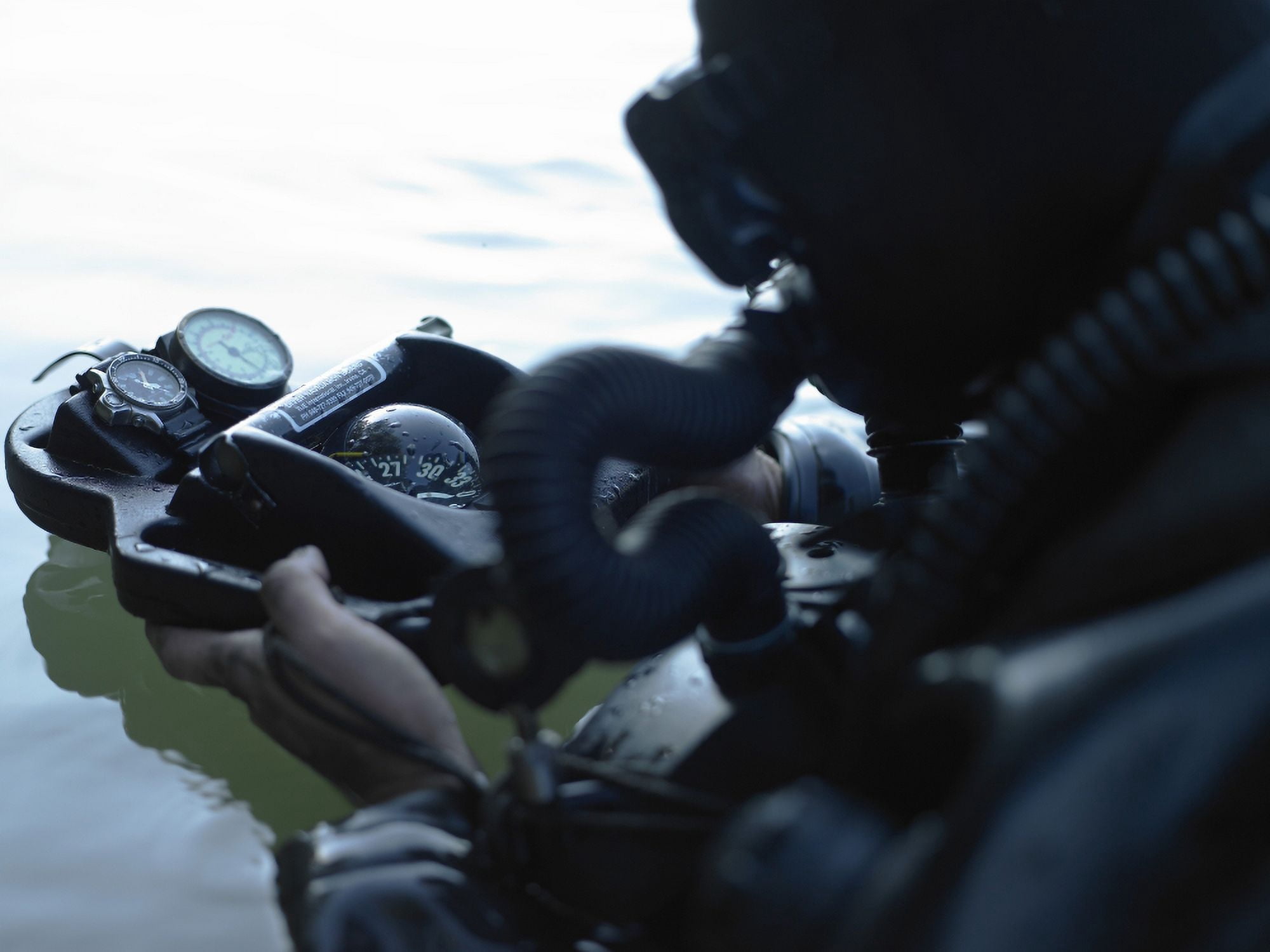 Special Forces combat diver takes a look at his compass Canvas Art - Tom WeberStocktrek Images (17 x 13)