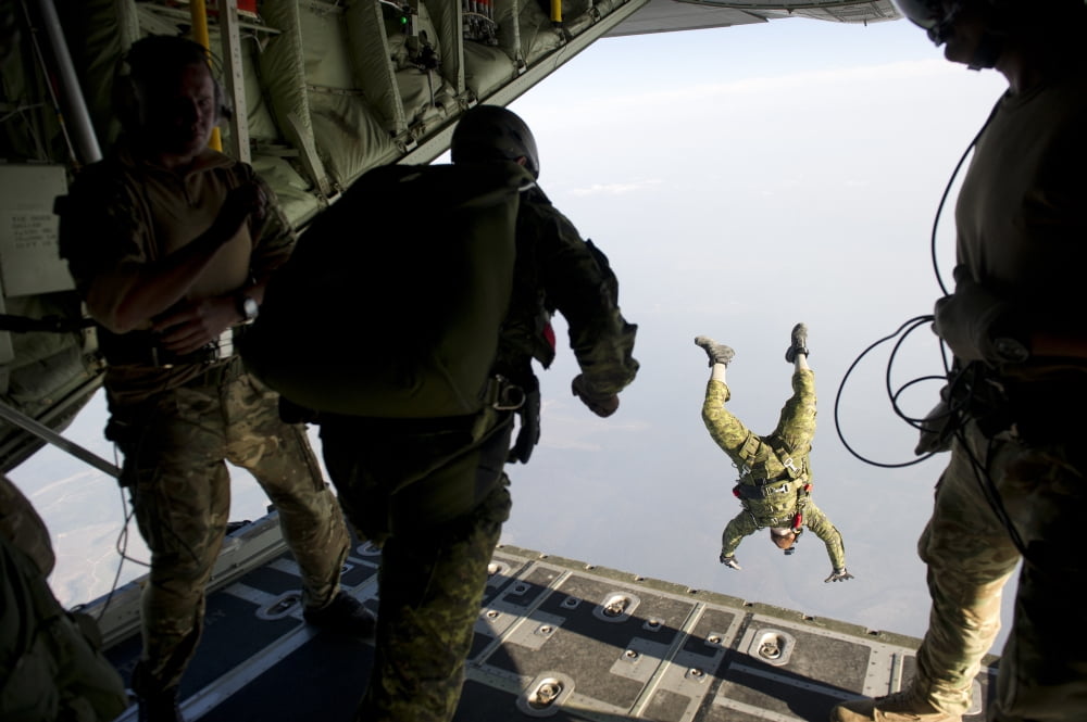 Special operations jumpers exit a C-130 aircraft over Florida Canvas Art - Stocktrek Images (34 x 23)
