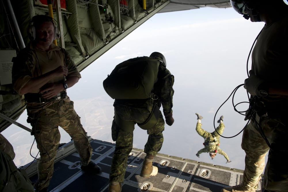 Special operations jumpers exit a C-130 aircraft over Florida Canvas Art - Stocktrek Images (34 x 23)