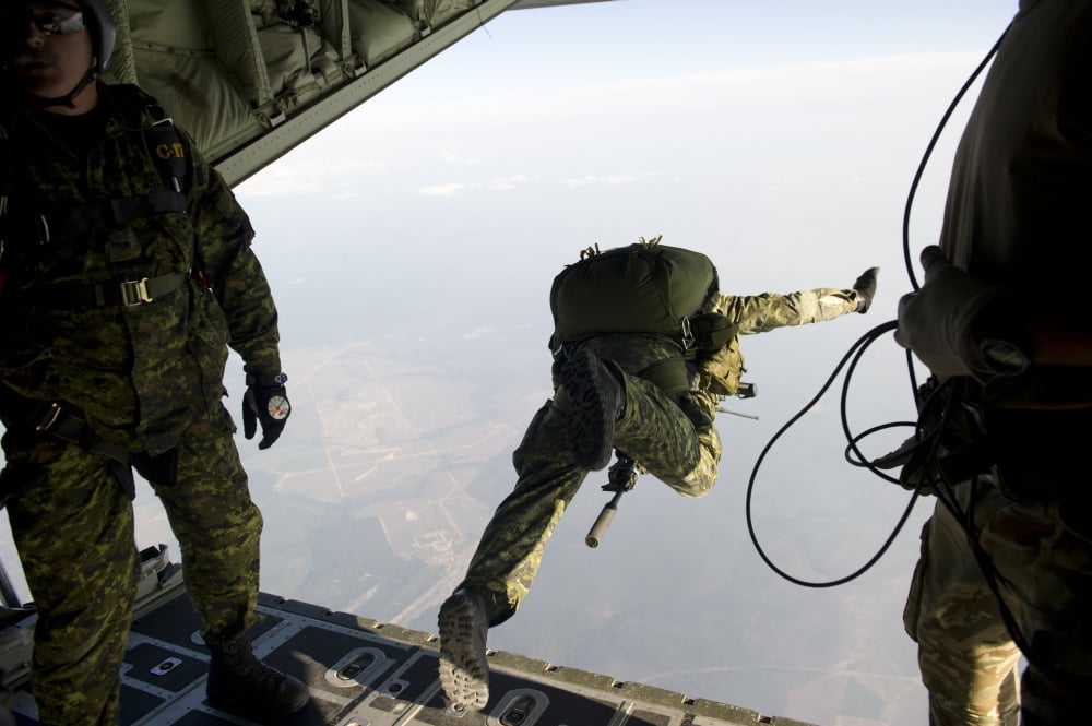Special operations jumpers exit a C-130 aircraft over Florida Canvas Art - Stocktrek Images (34 x 23)