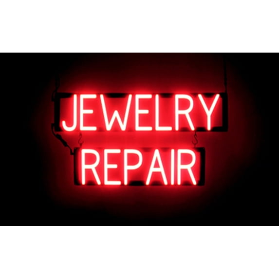 SpellBrite JEWELRY REPAIR LED Sign for Business. 28.0" x 15.0" Red JEWELRY REPAIR Sign Has Neon Sign Look With Energy Efficient LED Light Source. Visible from 500+ Feet, 8 Animation Settings.