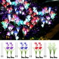 thumbnail image 1 of Spencer 2 Pack Outdoor Solar Garden Stake Lights Solar Powered Lights with 8 Lily Flowers, 7 Color Changing LED Solar Garden Lights for Patio, Yard, Lawn, Pathway (Blue), 1 of 11