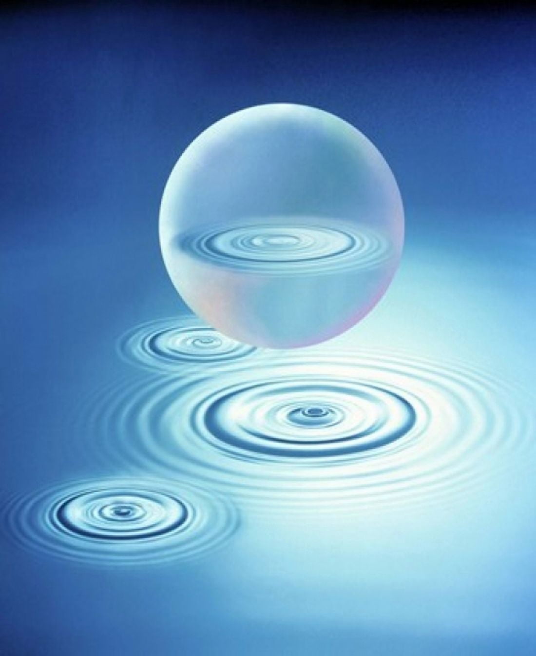 Sphere with water rings reflected in center floating above three rings in blue water Canvas Art - Panoramic Images (20 x 24)