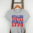 thumbnail image 1 of Spilling The Tea Since 1773 Groovy Patriotic Shirt, 4th of July T-shirt, History Teacher American Shirt, History Buff Boston Tea Party Tee (Colors:Athletic Heather; Sizes:3XL;), 1 of 2