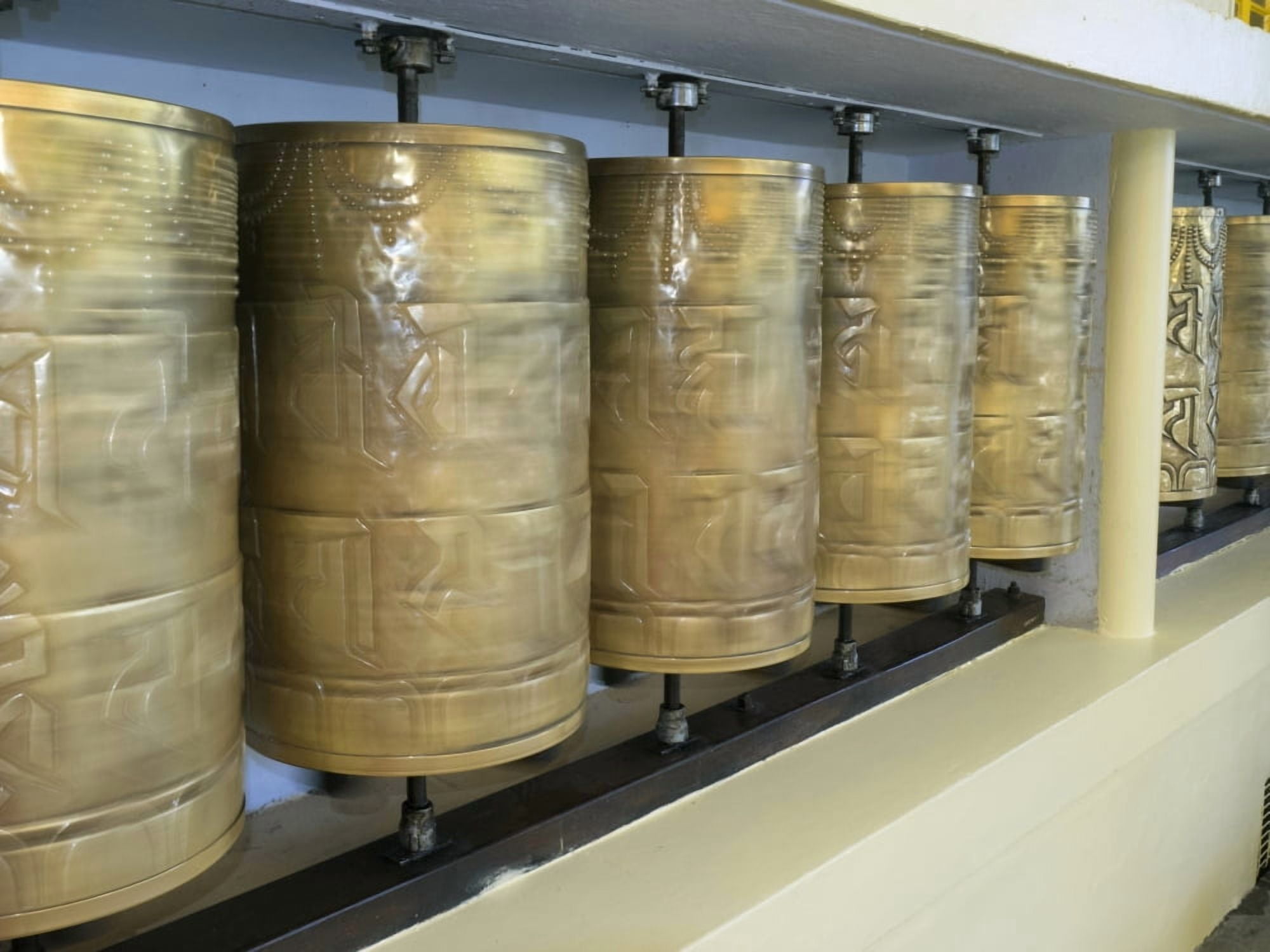 Spinning prayer wheels at Tsuglagkhang temple McLeod Ganj Dharamsala Himachal Pradesh India Canvas Art - Panoramic Images (12 x 16)
