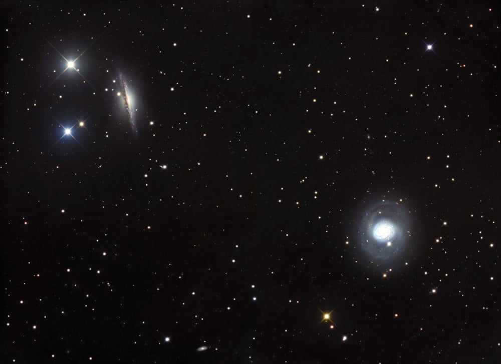 Spiral galaxies NGC 1068 and NGC 1055 located in the constellation Cetus Canvas Art - Robert GendlerStocktrek Images (33 x 24)