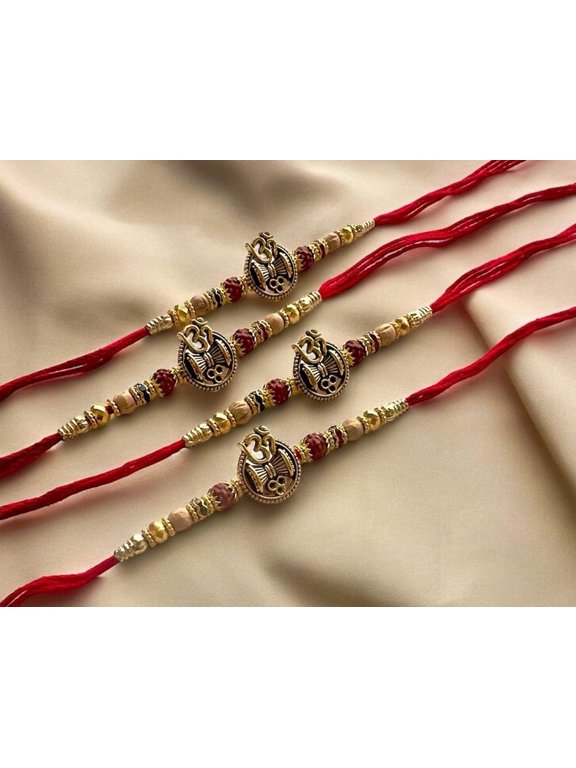Spiritual Om & Damru Rakhi  Handcrafted Red Thread Rakhi for Raksha Bandhan 2025