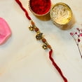 thumbnail image 1 of Spiritual Rakhi for Brother – Ganesha & Rudraksha Beads on Red Thread, 1 of 1