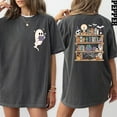 thumbnail image 1 of Spooky Bookshelf Ghost T-Shirt – Halloween Graphic Tee for Book Lovers with Cute Ghost & Stacked Books Design, 1 of 6