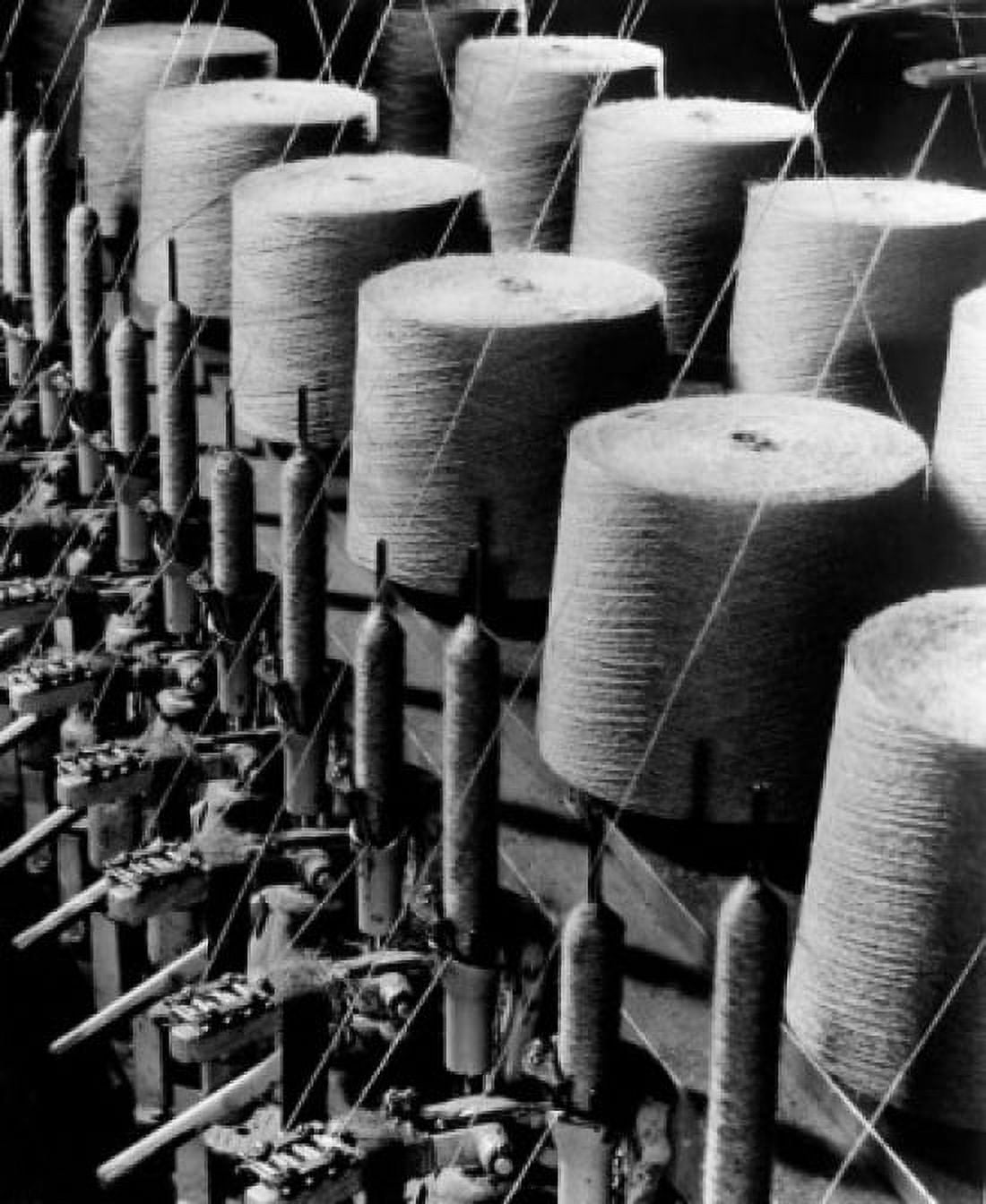 Spools of thread in textile factory Canvas Art - (24 x 36)