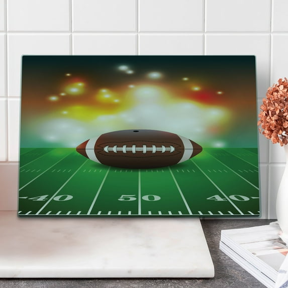 Sports Cutting Board, American Football Ball Warm Properties on Grass Turf Field Team Art Graphic, Decorative Tempered Glass Cutting and Serving Board, Large Size, Brown Green, by Ambesonne