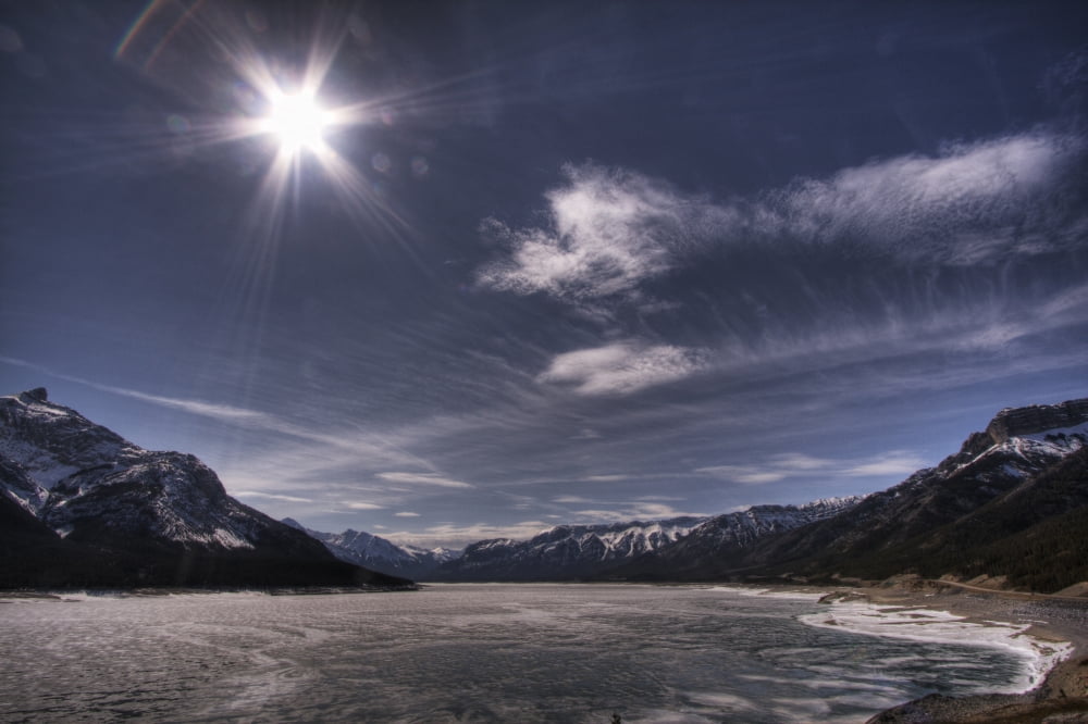 Spring Time Sun Over A Frozen Abraham Lake Alberta Rockies Canvas Art - Dan Jurak Design Pics (34 x 22)