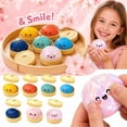 thumbnail image 1 of Squishy Dumplings Steamed Bun Stress Relief Toy, 3.35 Inches Slow Rising Fidget Toys with Basket Style Base Random Style, 1 of 6