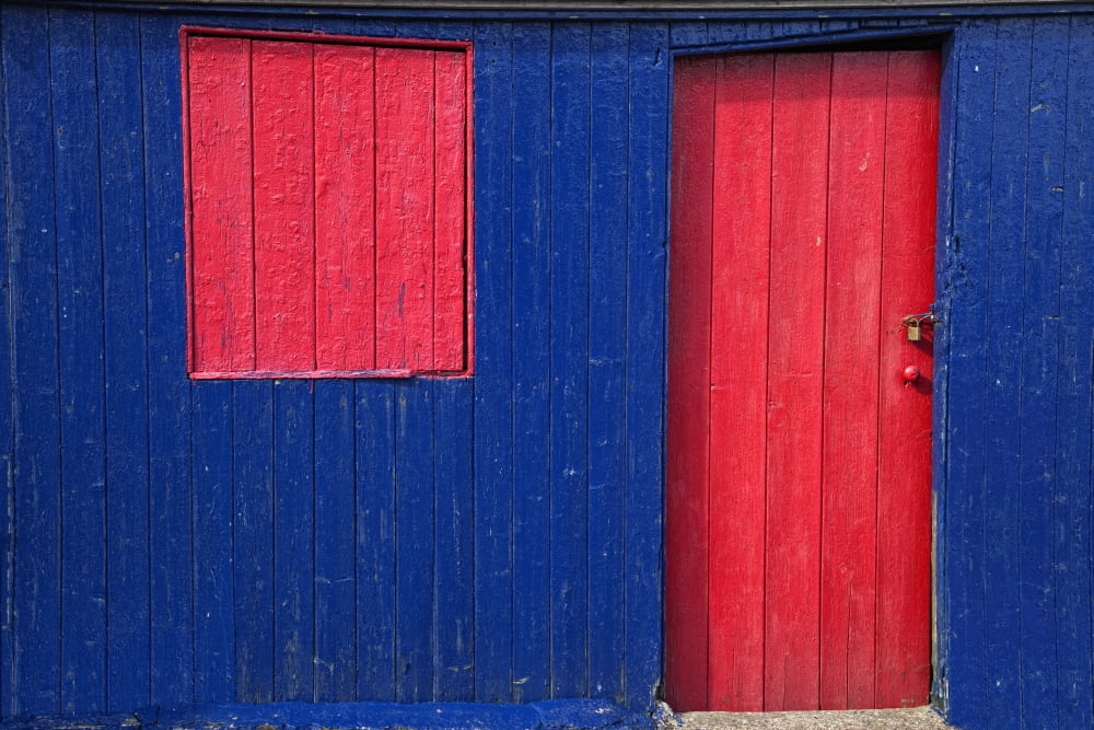 St Abbs Head Scottish Borders Scotland A Red Door And Window On A Blue Wooden Building Canvas Art - John Short Design Pics (19 x 12)