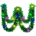 thumbnail image 1 of St. Patrick's Day Light Up Tinsel Garland, 2m Green Sparkly Fairy Lights with Shamrocks for St Patty's Party Decor, Home, Wall, Mantle, Table Decoration (Battery Operated), 1 of 5