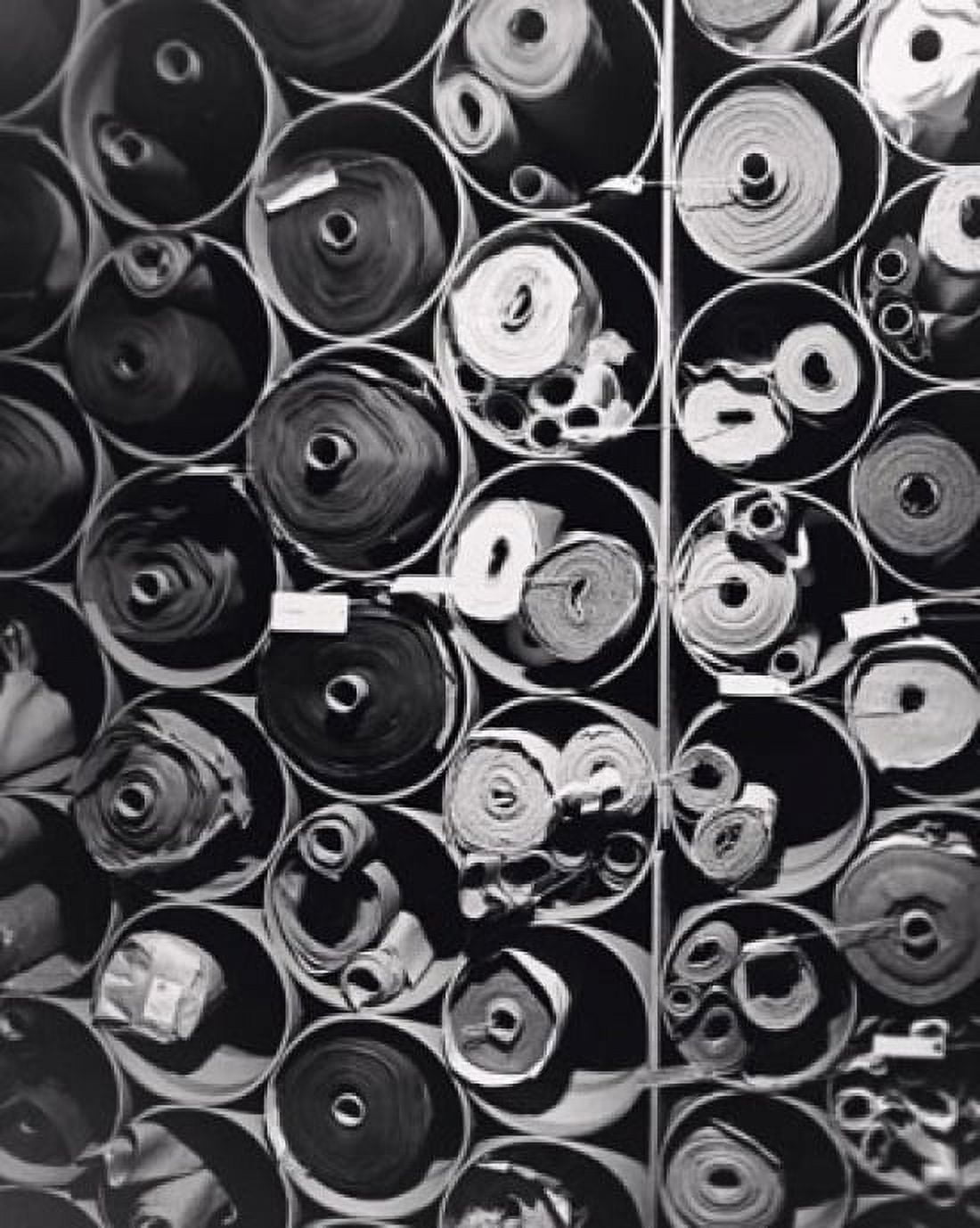 Stack of rolled-up clothing in a textile factory Canvas Art - (18 x 24)