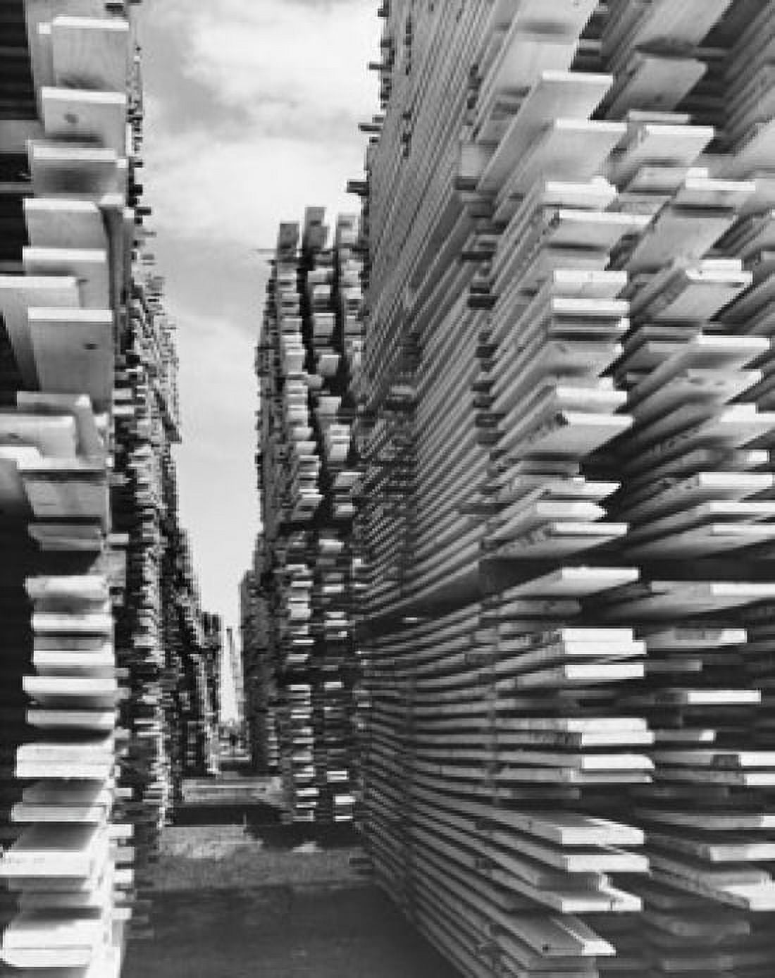 Stacks of planks in a lumber mill Canvas Art - (24 x 36)