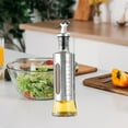 thumbnail image 1 of Stainless Steel Oil Bottle with Measurement Scale | Press Type Dispenser for Olive Oil Vinegar Seasoning | Automatic Spout | Durable Glass Core | 200ml 300ml 500ml | 1 Piece, 1 of 6