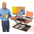thumbnail image 1 of Stand Steady X- Pro, Ergonomic Adjustable Height Standing Desk Converter for Home or Office, Easy Lift Sit to Stand Laptop Desk Riser for Laptop and Computer Monitor (Cherry, 28in x 20in), 1 of 7