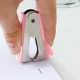 thumbnail image 1 of Staple Remover, Paper Staple Extractor, Efficient One Motion Staple Removal Tool with Rounded Edges, Compact Lightweight Design for Office and Home Use, Durable Plastic and Metal Construction, 1 of 8