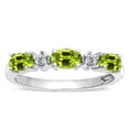 thumbnail image 1 of Star K � Oval 5x3 Genuine Peridot three stone oval band, 1 of 9
