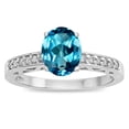 thumbnail image 1 of Star K � Oval 8x6 Genuine Blue Topaz Channel Set Engagement Promise Ring, 1 of 9