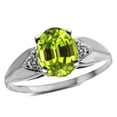thumbnail image 1 of Star K � Oval 9x7 Genuine Peridot trillion miracle setting wide band Ring, 1 of 9
