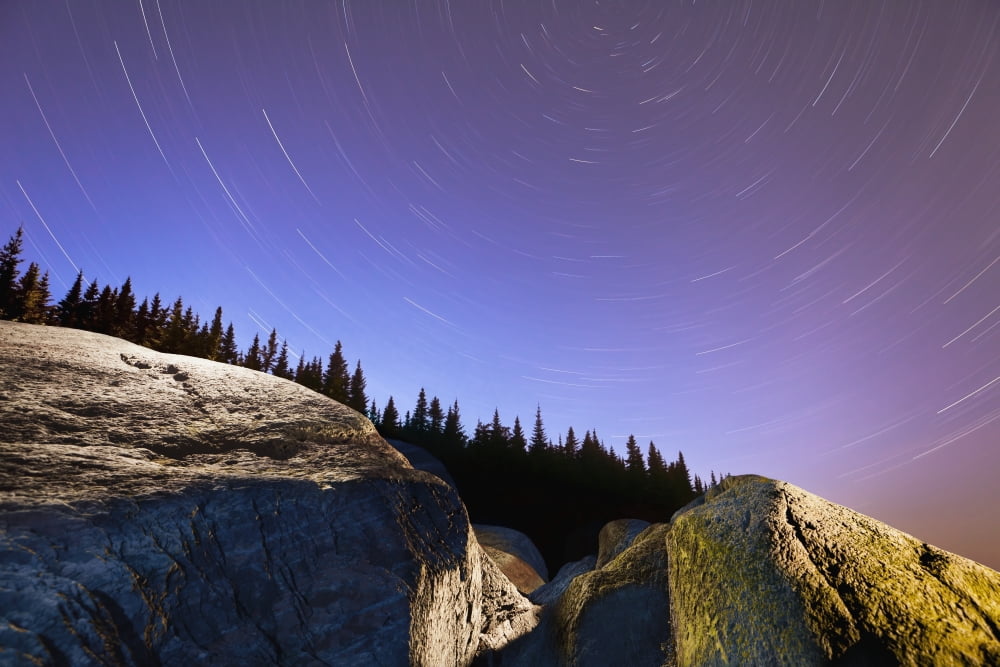 Star Trails Over Rocks In Saguenay-St Lawrence Marine Park Ile-Aux-Lievres Quebec Canada Canvas Art - Yves Marcoux Design Pics (18 x 12)