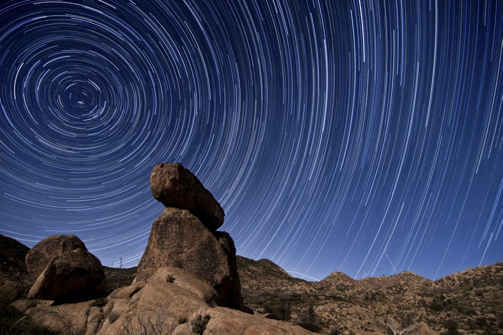 Star trails above a granite rock formation in Cleveland National Forest California Canvas Art - Dan BarrStocktrek Images (17 x 12)